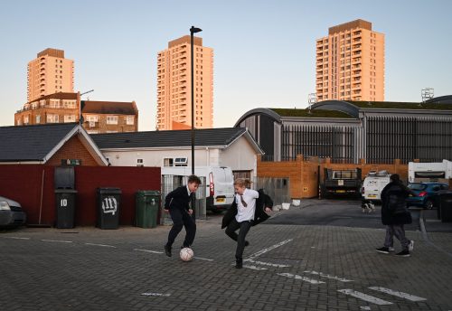 Children playing at a Council-run Gypsy and Traveller site in East London